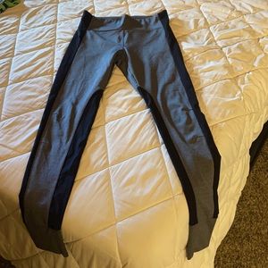 Athleta Essex Hybrid leggings. Black and grey. New. Size Medium Tall.